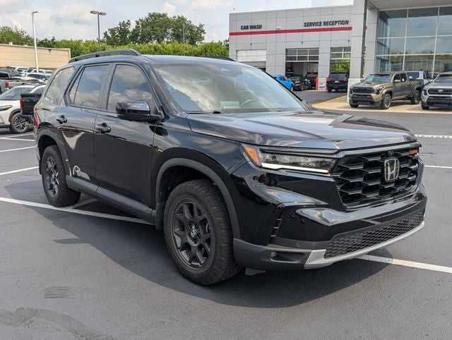 2025 Honda Pilot TrailSport in Black — front three-quarter view