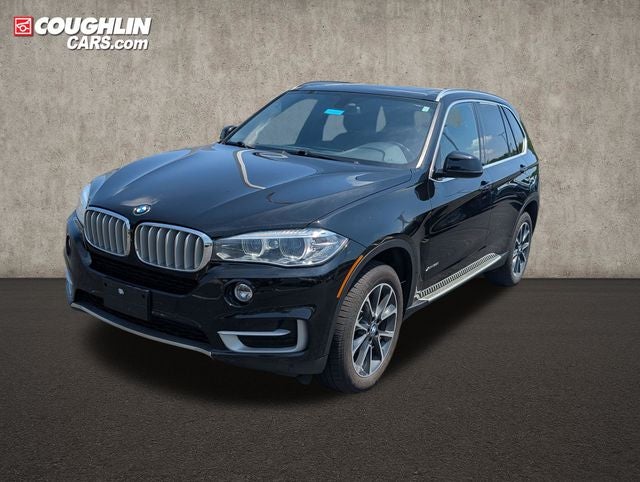 2017 BMW X5 — rear three-quarter view