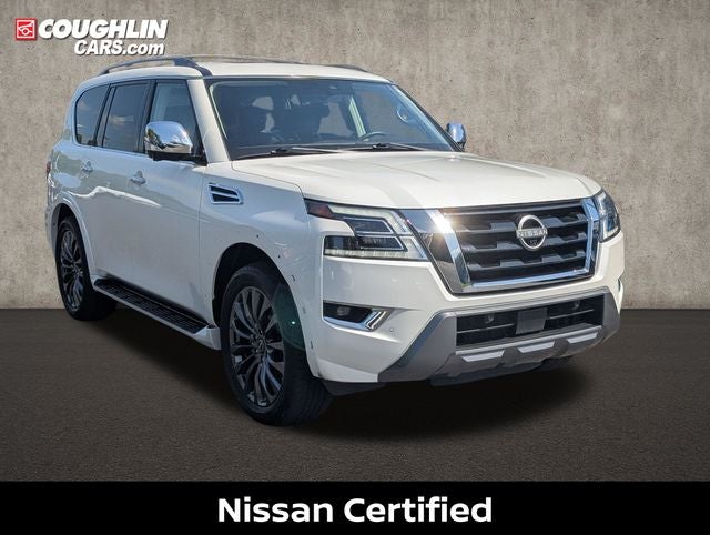 2023 Nissan Armada Platinum in Aspen White Tricoat — front three-quarter view