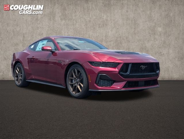 2026 Ford Mustang GT in Molten Magenta Metallic Tinted Clearcoat — front three-quarter view