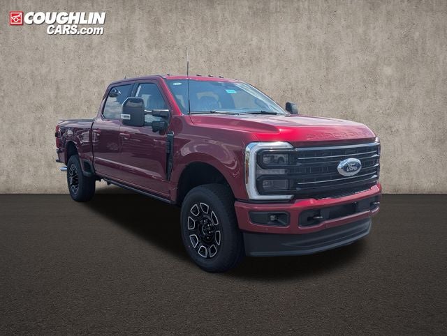 2026 Ford F-250SD Platinum in Ruby Red Metallic Tinted Clearcoat — front three-quarter view