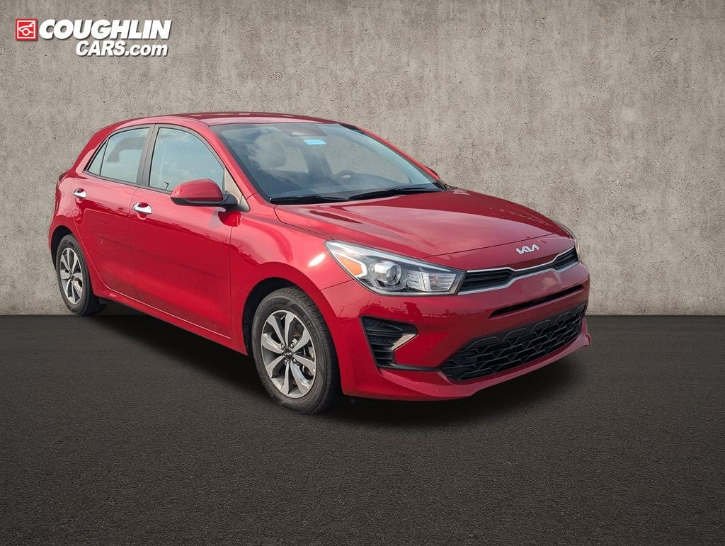 2023 Kia Rio S in Currant Red — front three-quarter view