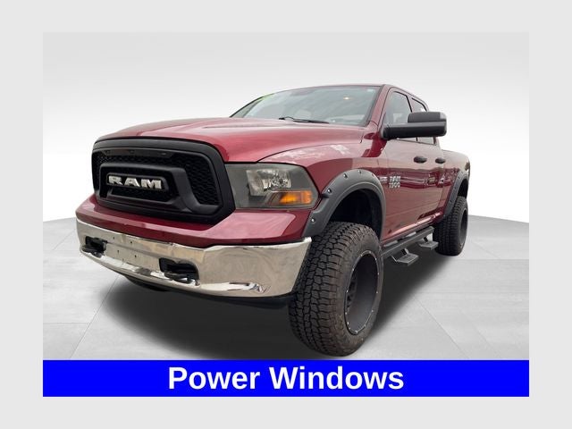 2015 RAM 1500 Tradesman in Deep Cherry Red Crystal Pearlcoat — front three-quarter view