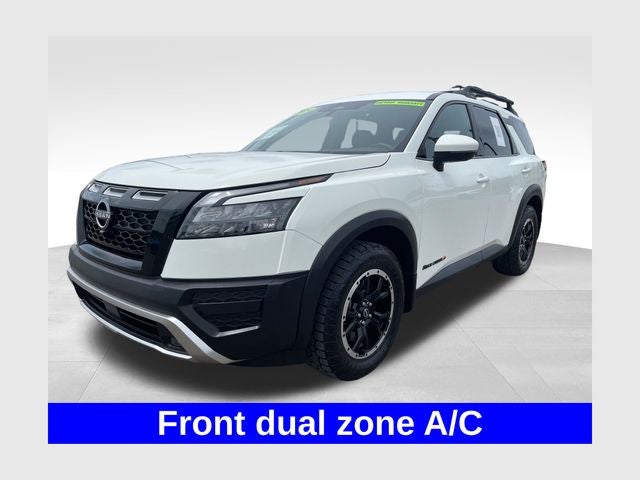 2024 Nissan Pathfinder Rock Creek in Glacier White — front three-quarter view