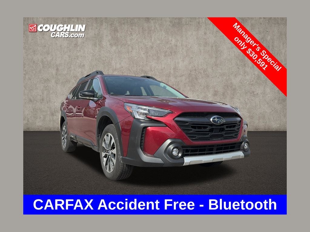 2025 Subaru Outback Limited in Crimson Red Pearl — front three-quarter view