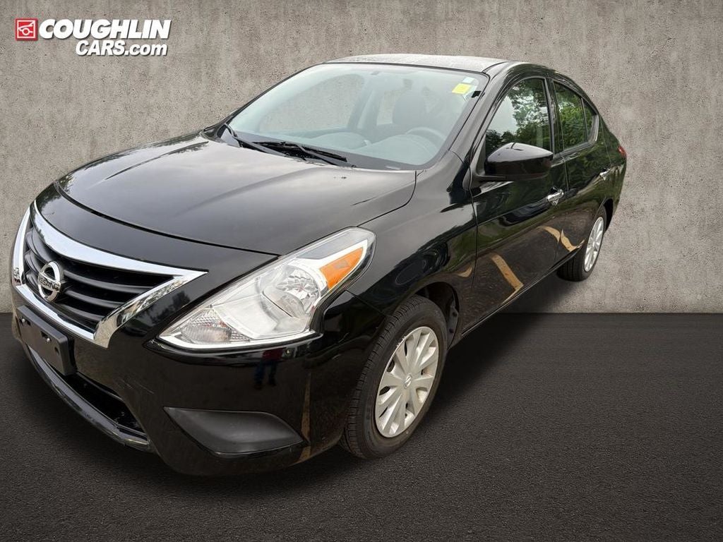2018 Nissan Versa — rear three-quarter view