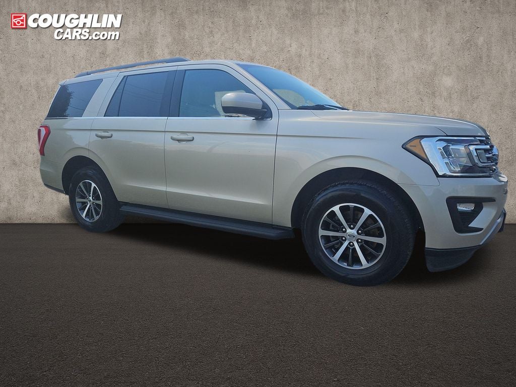 2018 Ford Expedition XLT in White Gold Metallic — front three-quarter view