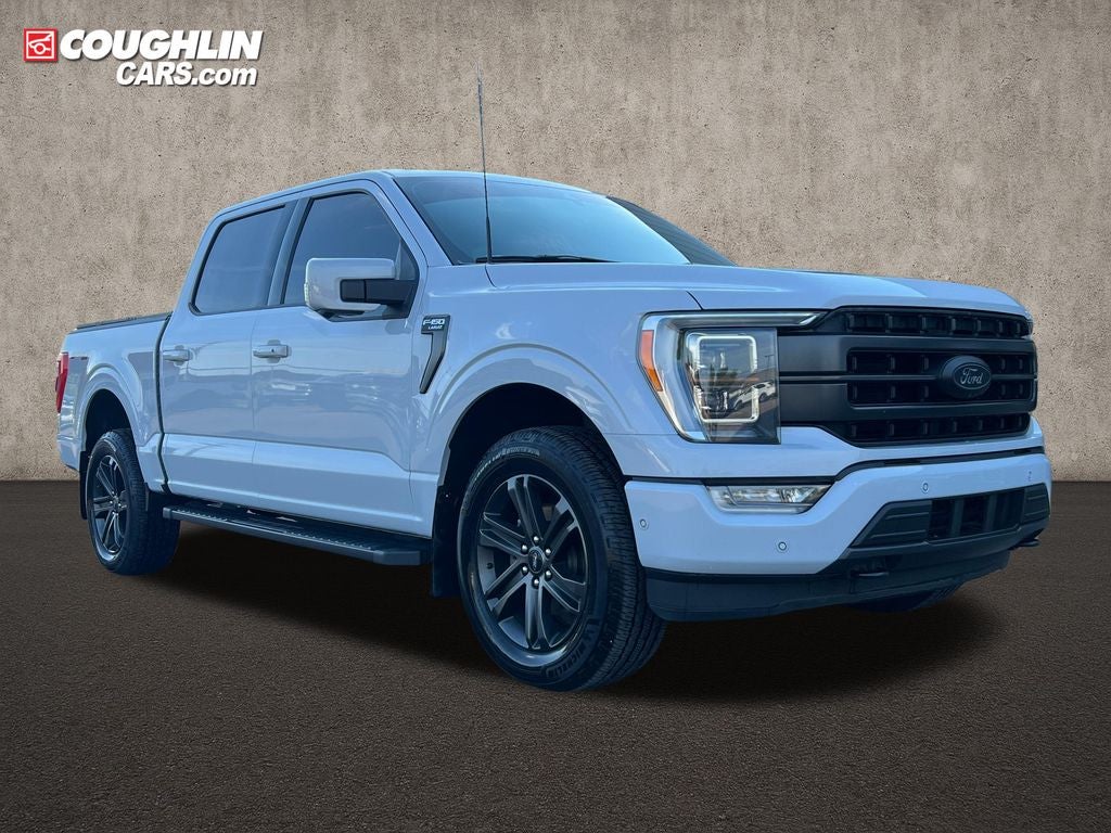 2022 Ford F-150 Lariat in White Metallic — front three-quarter view
