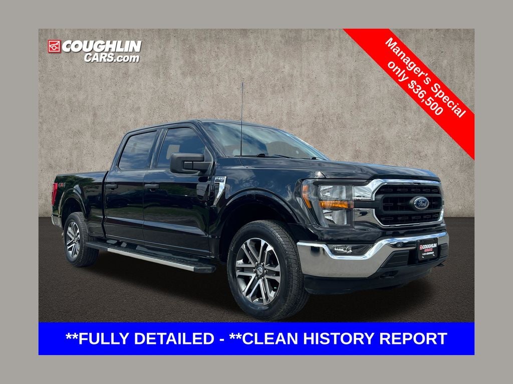 2023 Ford F-150 XLT in Agate Black Metallic — front three-quarter view