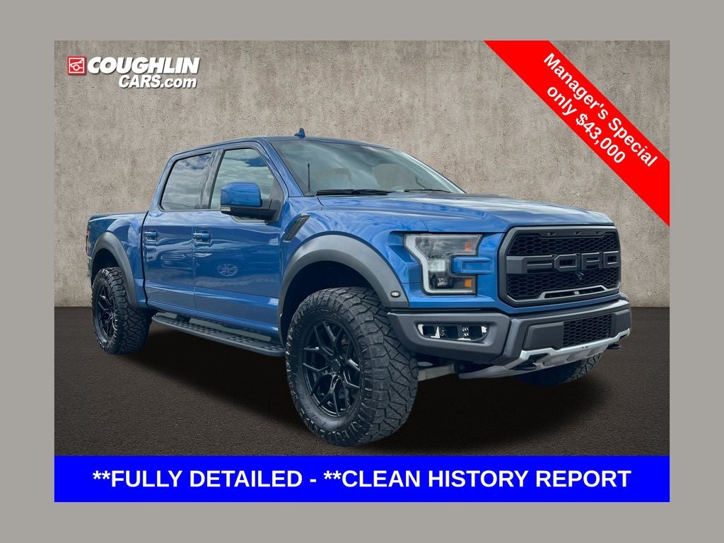2019 Ford F-150 Raptor in Blue Metallic — front three-quarter view