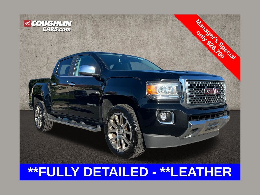 2019 GMC Canyon Denali in Onyx Black — front three-quarter view