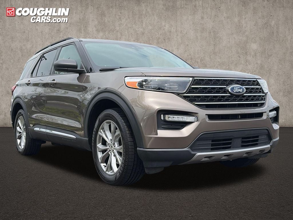 2021 Ford Explorer XLT in Stone Gray Metallic — front three-quarter view