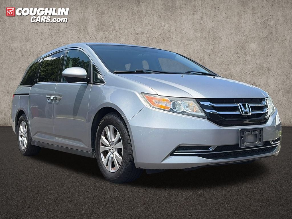 2016 Honda Odyssey SE in Silver — front three-quarter view