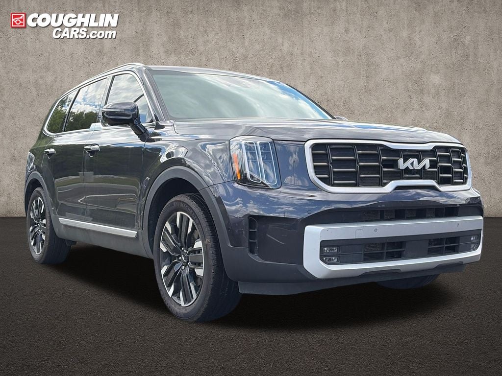 2025 Kia Telluride SX-Prestige in Panthera Metal — front three-quarter view