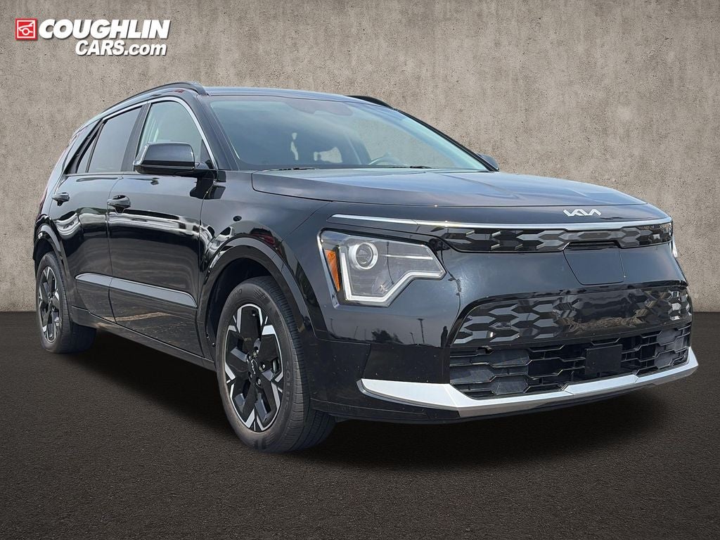 2024 Kia Niro EV Wind in Aurora Black — front three-quarter view