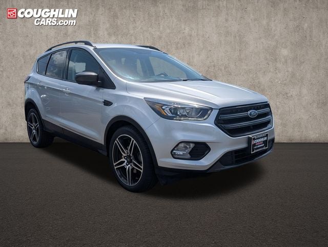2019 Ford Escape SEL in Ingot Silver Metallic — front three-quarter view