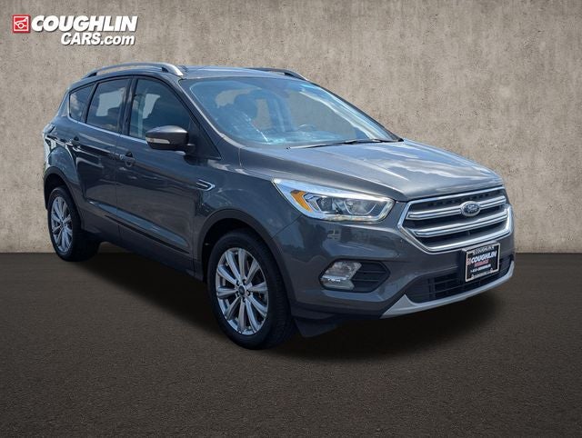 2017 Ford Escape Titanium in Magnetic Metallic — front three-quarter view