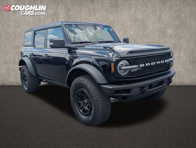 2023 Ford Bronco Wildtrak in Shadow Black — front three-quarter view