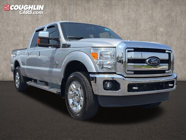 2012 Ford F-250SD Lariat in Ingot Silver — front three-quarter view