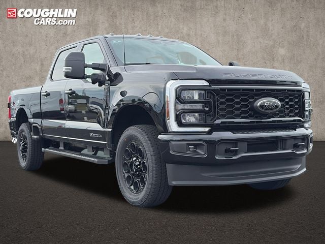 2026 Ford F-350SD Lariat in Agate Black Metallic — front three-quarter view