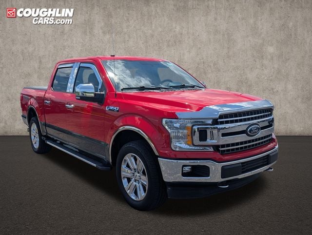 2018 Ford F-150 XLT in Race Red — front three-quarter view