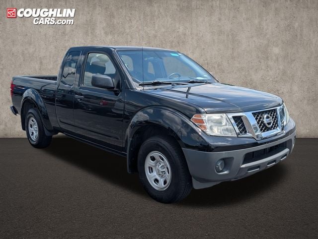 2019 Nissan Frontier S in Magnetic Black Pearl — front three-quarter view