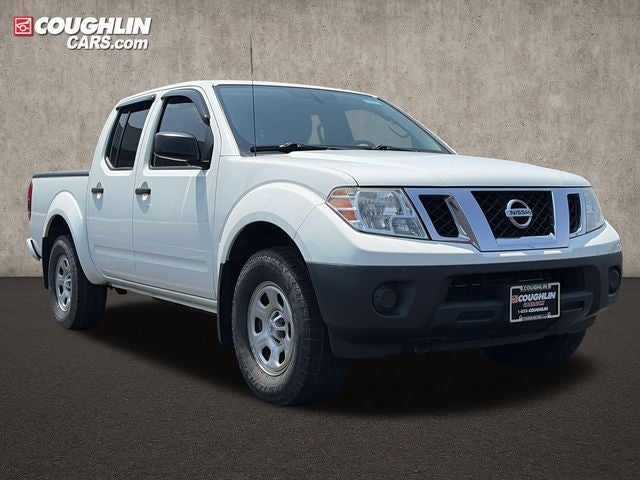 2017 Nissan Frontier S in Glacier White — front three-quarter view