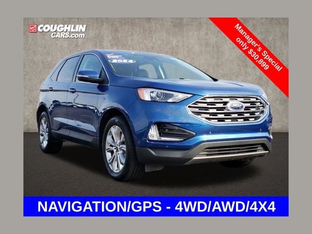 2024 Ford Edge Titanium in Atlas Blue Metallic — front three-quarter view
