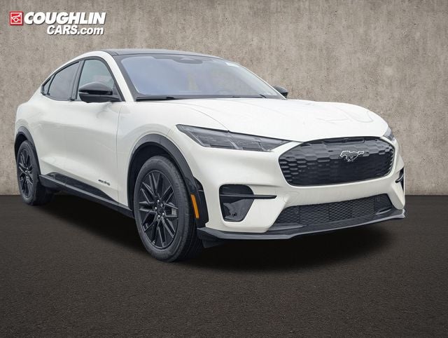 2026 Ford Mustang Mach-E Premium in Star White Metallic Tri-Coat — front three-quarter view