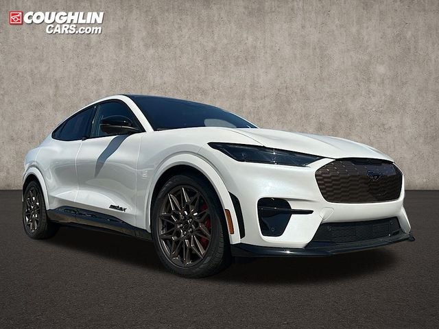 2025 Ford Mustang Mach-E GT in Star White Metallic Tri-Coat — front three-quarter view