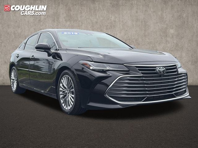 2019 Toyota Avalon Limited in Opulent Amber — front three-quarter view