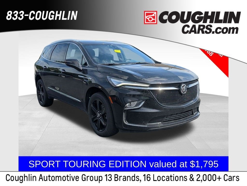 2024 Buick Enclave Essence in Ebony Twilight Metallic — front three-quarter view