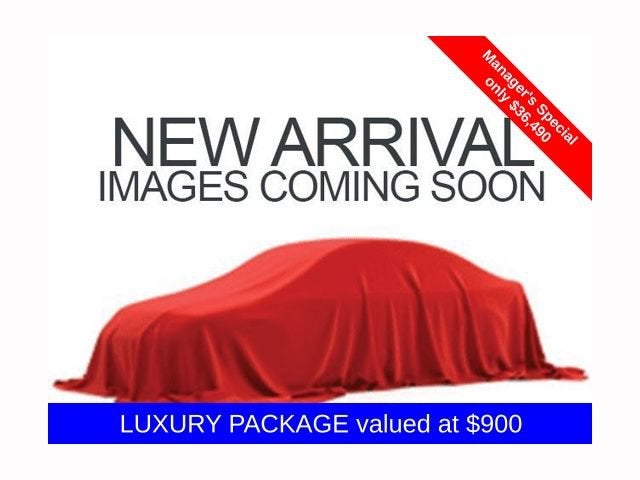 2024 GMC Acadia Elevation in Ebony Twilight Metallic — front three-quarter view