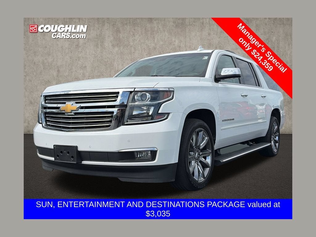 2018 Chevrolet Suburban Premier in Summit White — front three-quarter view