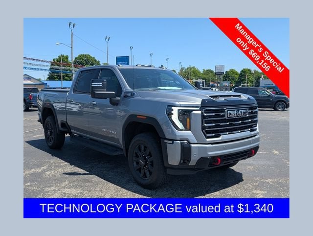 2026 GMC Sierra 2500 HD AT4 in Sterling Metallic — front three-quarter view