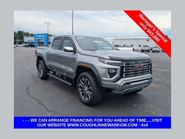 2023 GMC Canyon Denali in Sterling Metallic — front three-quarter view